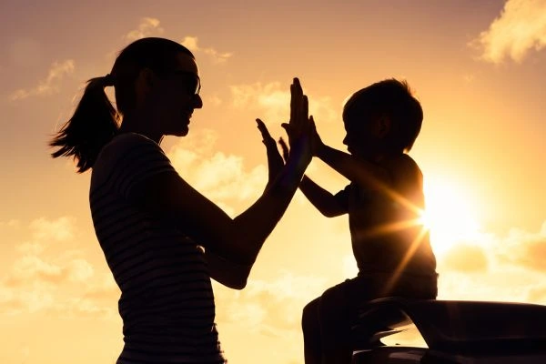 Image of happy mother and child after resolving child arrangements York